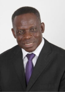 Professional Headshot of a Smiling Man in Suit and Tie