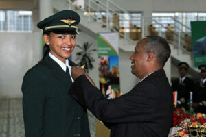 Celebrating a New Pilot's Achievement Ceremony A proud moment as an instructor pins a badge on a pilot.