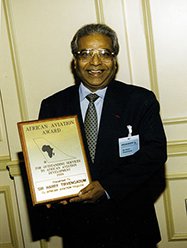 "Honouring Achievements: African Aviation Award Winner" "Awards ceremony photo featuring an African Aviation Award recipient."