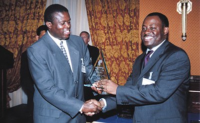 "Recognition and Achievement Ceremony: Award Presentation Moment"