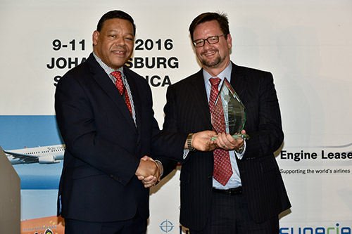 2016 Aviation Awards Ceremony in Johannesburg Two men exchange an award during a ceremony in Johannesburg, 2016.